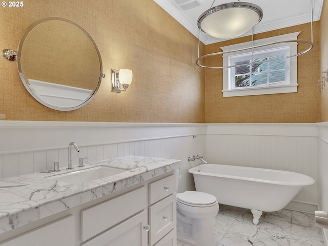 10305 Pine Ridge Dr, Manzanita, OR 97130 - full bath with a freestanding tub, wainscoting, vanity, marble look tiles, and ornamental molding