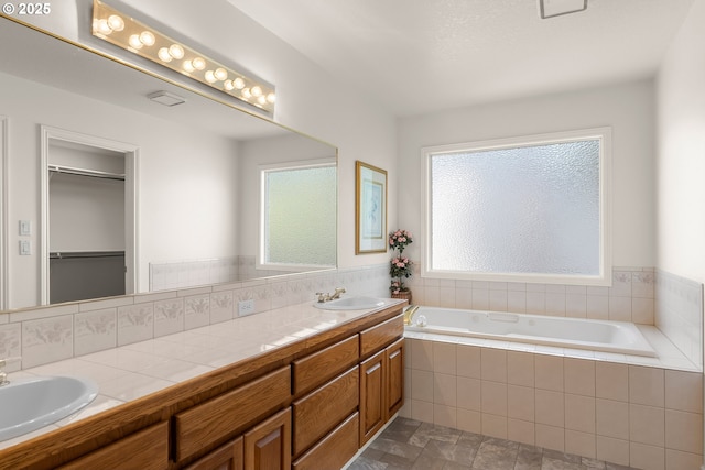 15150 SE Lostine Dr, Clackamas, OR 97015 - full bath featuring double vanity, a bath, plenty of natural light, and a walk in closet