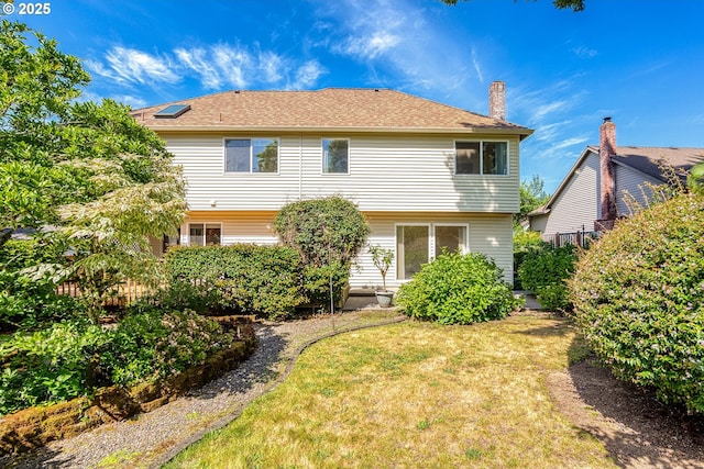 15150 SE Lostine Dr, Clackamas, OR 97015 - rear view of property featuring a chimney and a lawn