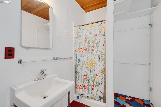 8890 Ocean Crest Ln, Manzanita, OR 97130 - full bathroom featuring wood ceiling, a sink, and a shower with shower curtain