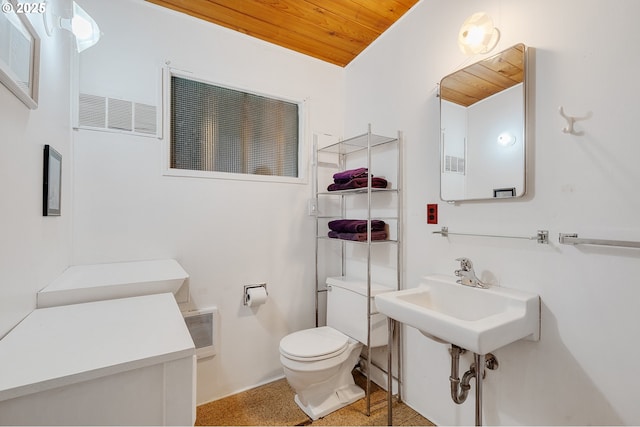 8890 Ocean Crest Ln, Manzanita, OR 97130 - bathroom featuring wooden ceiling, toilet, and a sink
