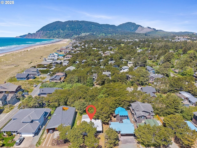 8890 Ocean Crest Ln, Manzanita, OR 97130 - aerial view of property and surrounding area with nearby suburban area and a water and mountain view
