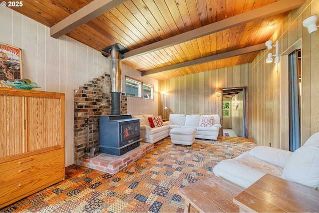 8890 Ocean Crest Ln, Manzanita, OR 97130 - living area featuring a wood stove and wooden walls