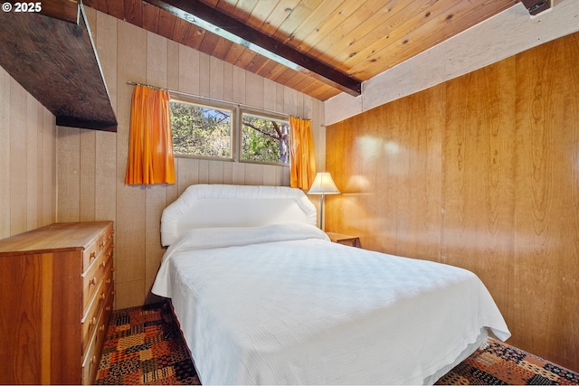 8890 Ocean Crest Ln, Manzanita, OR 97130 - bedroom with wooden walls and wood ceiling with exposed beams