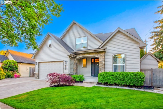 195 Daniel Dr, Eugene, OR 97404 - traditional-style home featuring stone siding, concrete driveway, and a porch
