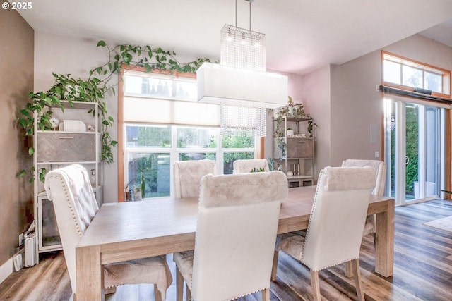 195 Daniel Dr, Eugene, OR 97404 - dining space featuring a chandelier and wood finished floors
