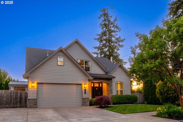 195 Daniel Dr, Eugene, OR 97404 - view of front of house with stone siding and concrete driveway