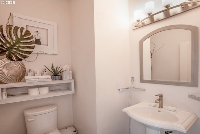 195 Daniel Dr, Eugene, OR 97404 - half bathroom featuring toilet and a sink