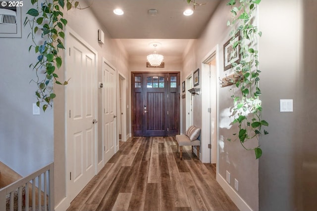 195 Daniel Dr, Eugene, OR 97404 - entryway with wood finished floors and a chandelier