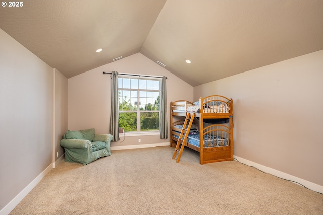 carpeted bedroom with lofted ceiling, baseboards, and recessed lighting