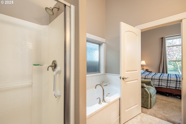 bathroom with a stall shower, tile patterned flooring, a garden tub, and connected bathroom