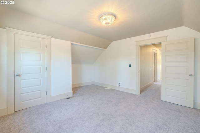 7906 SE Woodstock Blvd, Portland, OR 97206 - additional living space featuring light colored carpet, lofted ceiling, and baseboards