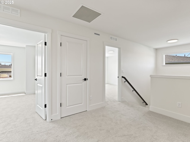 1208 N 44th Pl, Ridgefield, WA 98642 - interior space featuring visible vents, carpet, and baseboards
