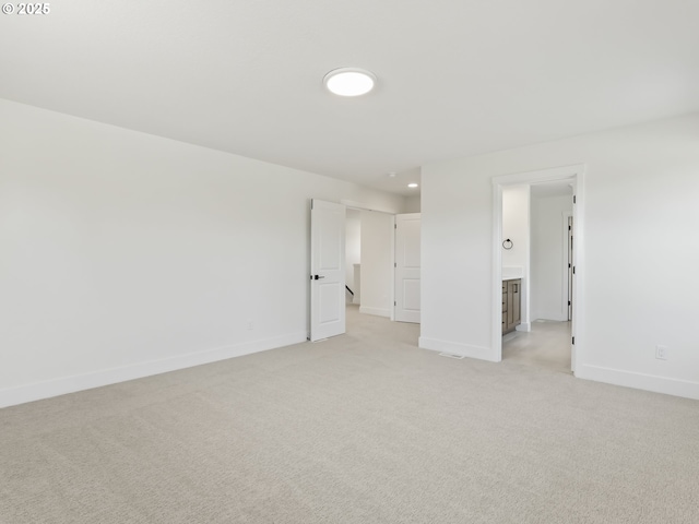 1208 N 44th Pl, Ridgefield, WA 98642 - unfurnished room featuring baseboards and light carpet