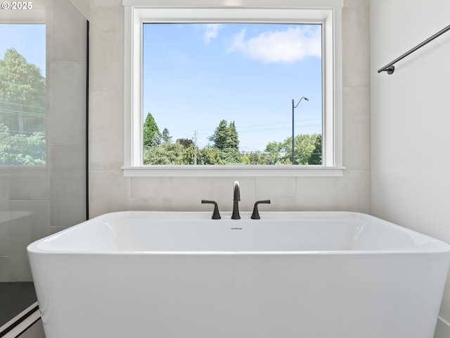 1208 N 44th Pl, Ridgefield, WA 98642 - full bathroom with a freestanding tub and a wealth of natural light
