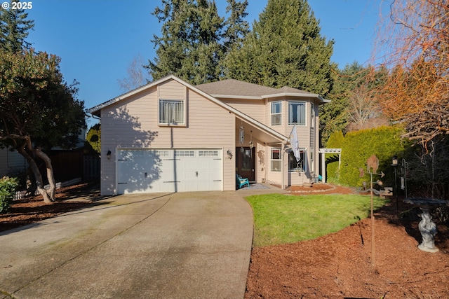 front facade featuring a garage and a front lawn