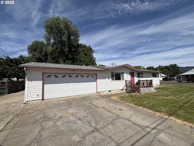 2312 N Pine St, La Grande, OR 97850 - view of front of property with concrete driveway, crawl space, and a garage