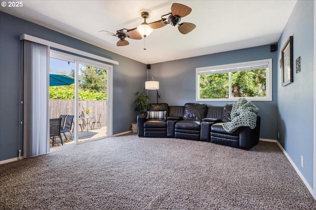 5570 SW Franklin Ave, Beaverton, OR 97005 - living area with carpet floors, a ceiling fan, and baseboards