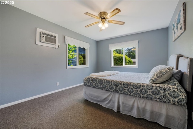 5570 SW Franklin Ave, Beaverton, OR 97005 - carpeted bedroom featuring a wall mounted air conditioner, baseboards, and a ceiling fan
