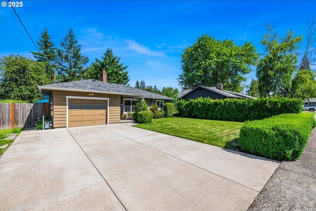 5570 SW Franklin Ave, Beaverton, OR 97005 - single story home featuring an attached garage, driveway, and a chimney