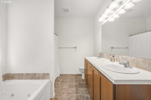 18385 Inglis Rd, Clatskanie, OR 97016 - full bath featuring double vanity, toilet, a tub with jets, baseboards, and a shower with shower curtain