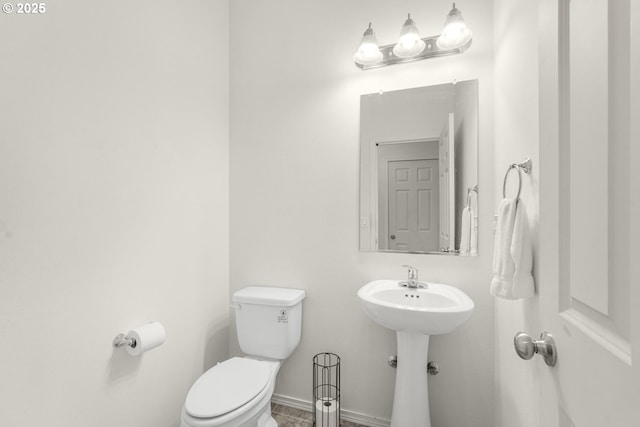 18385 Inglis Rd, Clatskanie, OR 97016 - bathroom with toilet and baseboards