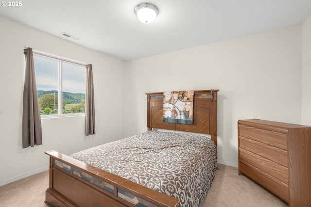 18385 Inglis Rd, Clatskanie, OR 97016 - bedroom with light carpet and baseboards