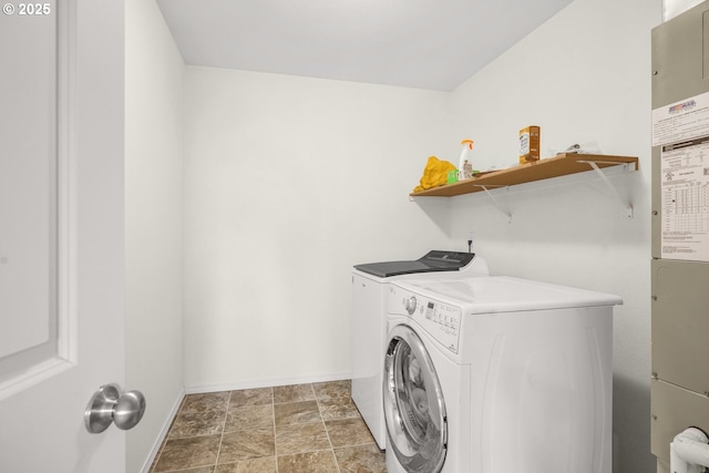 18385 Inglis Rd, Clatskanie, OR 97016 - laundry room featuring washer and clothes dryer and baseboards