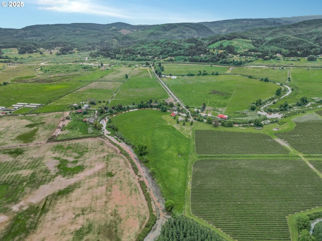 18385 Inglis Rd, Clatskanie, OR 97016 - aerial overview of property's location with rural landscape, mountains, and farmland