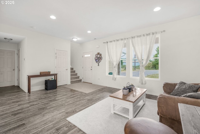 18385 Inglis Rd, Clatskanie, OR 97016 - living room with wood finished floors, recessed lighting, stairs, and baseboards