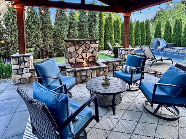 view of patio / terrace with an outdoor hangout area and a pool