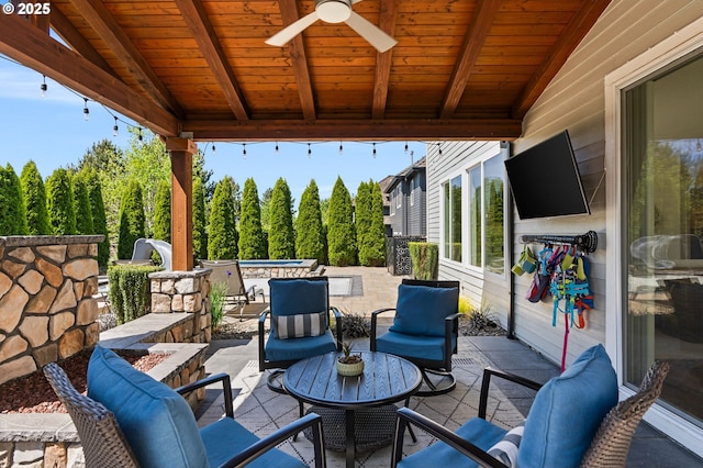 view of patio / terrace featuring a ceiling fan and outdoor lounge area