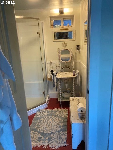 full bathroom with a stall shower
