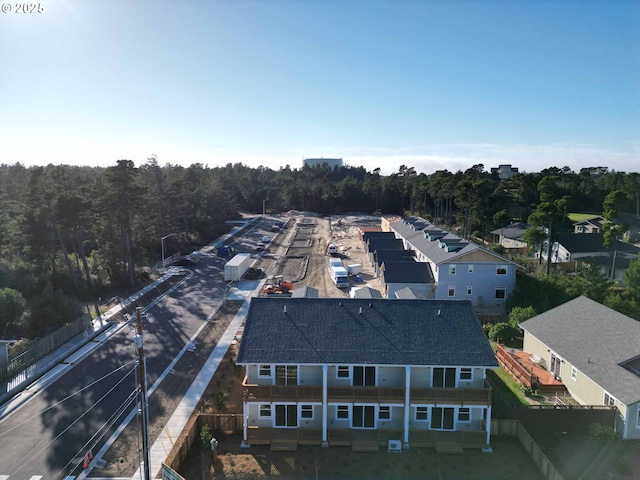 aerial view featuring a view of trees