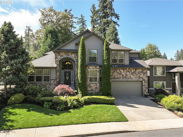 16572 SE Oak Meadow Ct, Damascus, OR 97089 - view of front facade with stone siding, concrete driveway, a front lawn, and a garage