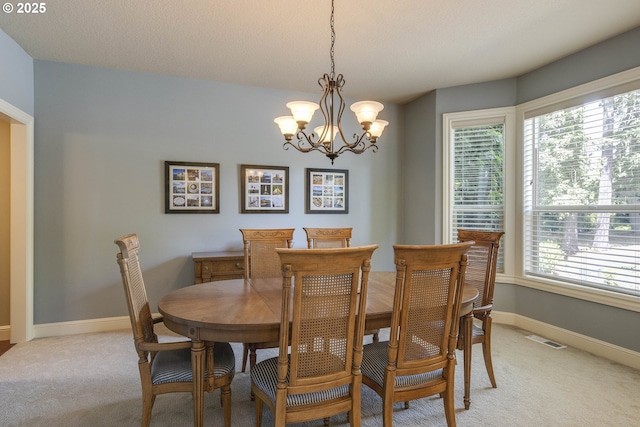 16572 SE Oak Meadow Ct, Damascus, OR 97089 - dining room featuring light carpet and a chandelier