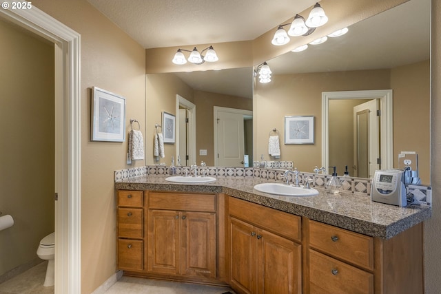 16572 SE Oak Meadow Ct, Damascus, OR 97089 - full bathroom featuring double vanity and tile patterned floors