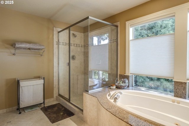16572 SE Oak Meadow Ct, Damascus, OR 97089 - full bathroom featuring a garden tub, a shower stall, and tile patterned floors
