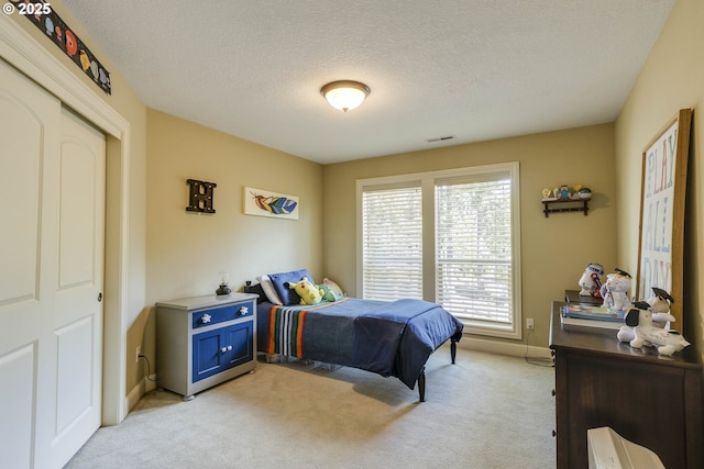 16572 SE Oak Meadow Ct, Damascus, OR 97089 - bedroom featuring light colored carpet and a textured ceiling