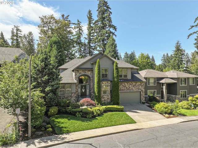 16572 SE Oak Meadow Ct, Damascus, OR 97089 - view of front of home with stone siding, concrete driveway, an attached garage, and a front lawn
