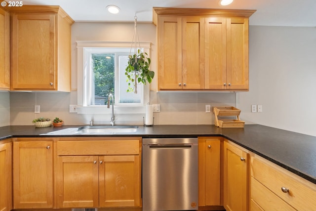 511 NE Skidmore St, Portland, OR 97211 - kitchen featuring stainless steel dishwasher, dark countertops, recessed lighting, and backsplash