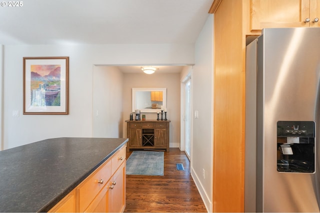 511 NE Skidmore St, Portland, OR 97211 - kitchen featuring stainless steel fridge with ice dispenser and dark wood-style floors