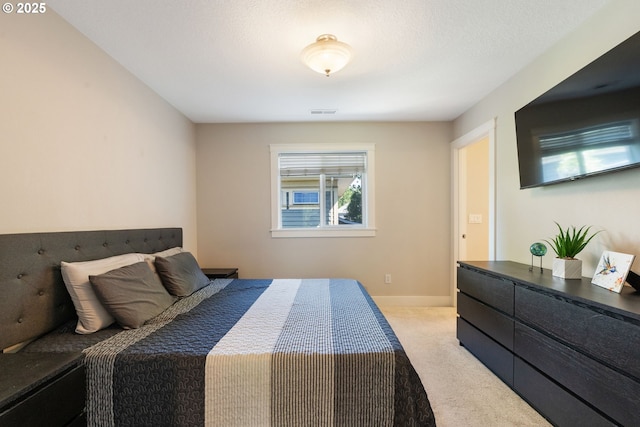 511 NE Skidmore St, Portland, OR 97211 - carpeted bedroom featuring baseboards