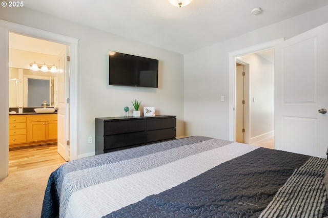 511 NE Skidmore St, Portland, OR 97211 - bedroom with light carpet and ensuite bath