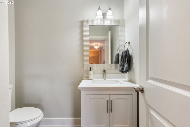 511 NE Skidmore St, Portland, OR 97211 - bathroom featuring vanity and toilet