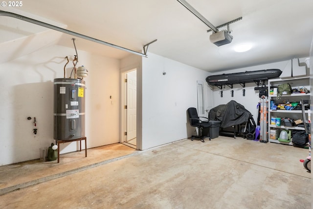 511 NE Skidmore St, Portland, OR 97211 - garage with secured water heater and a garage door opener