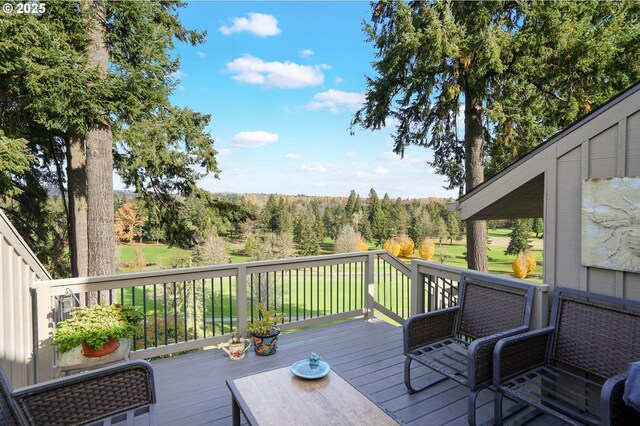 wooden deck featuring outdoor lounge area