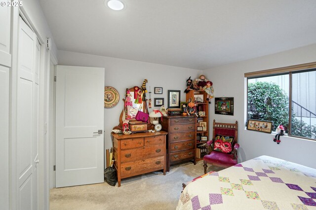 carpeted bedroom featuring a textured ceiling