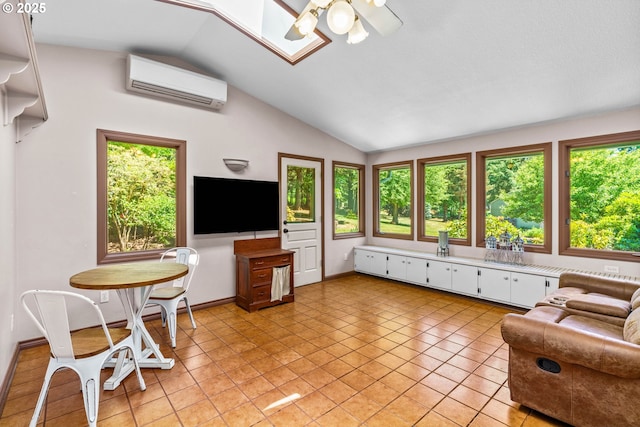 38383 Cartwright Creek Rd, Marcola, OR 97454 - living area with an AC wall unit, healthy amount of natural light, lofted ceiling, and ceiling fan