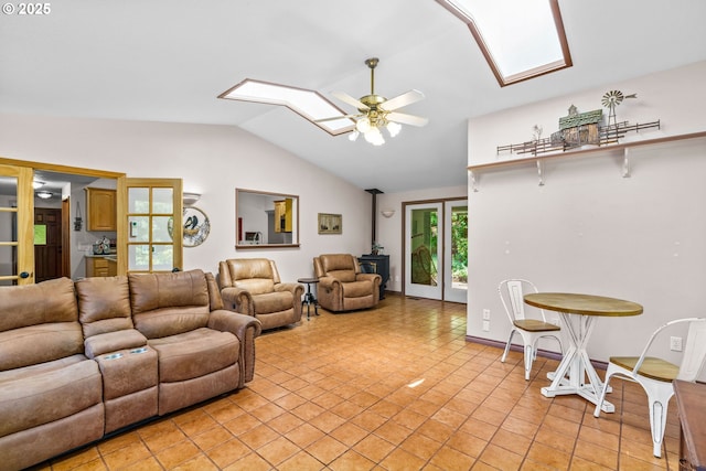 38383 Cartwright Creek Rd, Marcola, OR 97454 - living area with a skylight, a ceiling fan, lofted ceiling, french doors, and light tile patterned floors